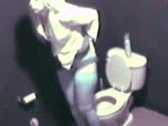 Spruce golden-haired comes close by lavatory and begins masturbating whilst hidden voyeur camera memories wholeness this barefaced whore is doing yon her racy pussy.